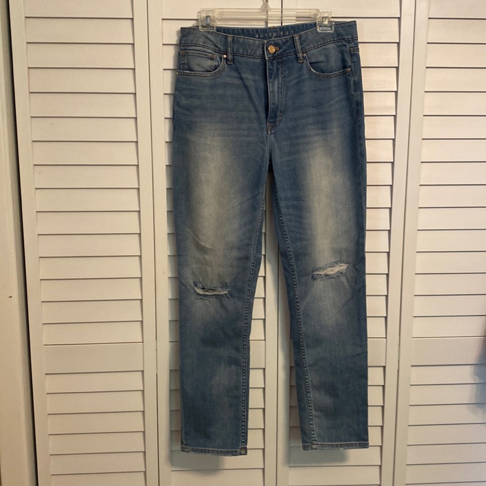 WHBM size 10 Jeans, distressed, Holes in knees.